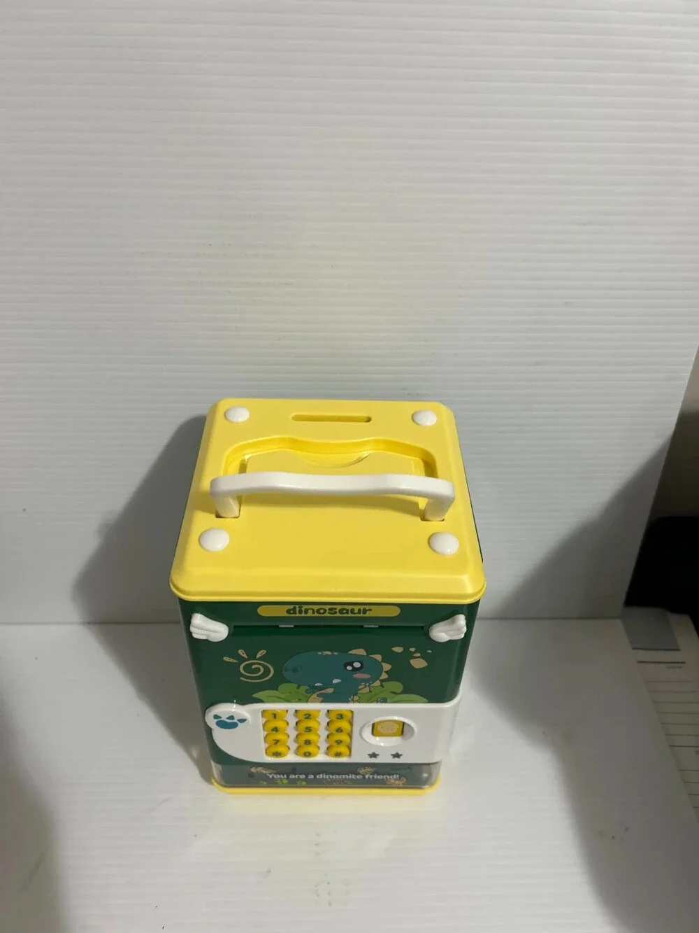 Título  Dinosaur Electronic Piggy Bank Password Safe Coin & Cash Saving Box for